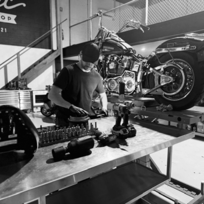 Motorcycle being serviced at Express Motorcycle Services workshop